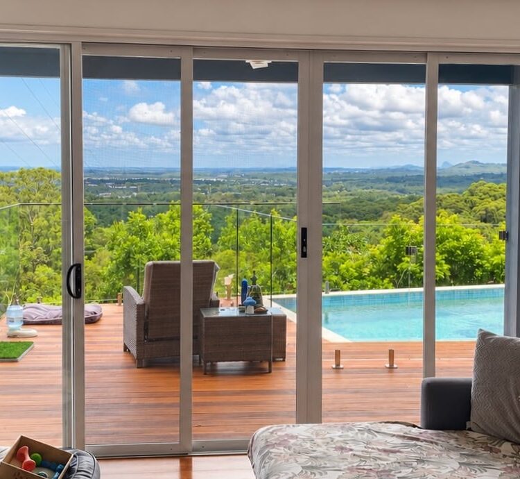 SecureView sliding security doors preserving hinterland views from a Buderim home